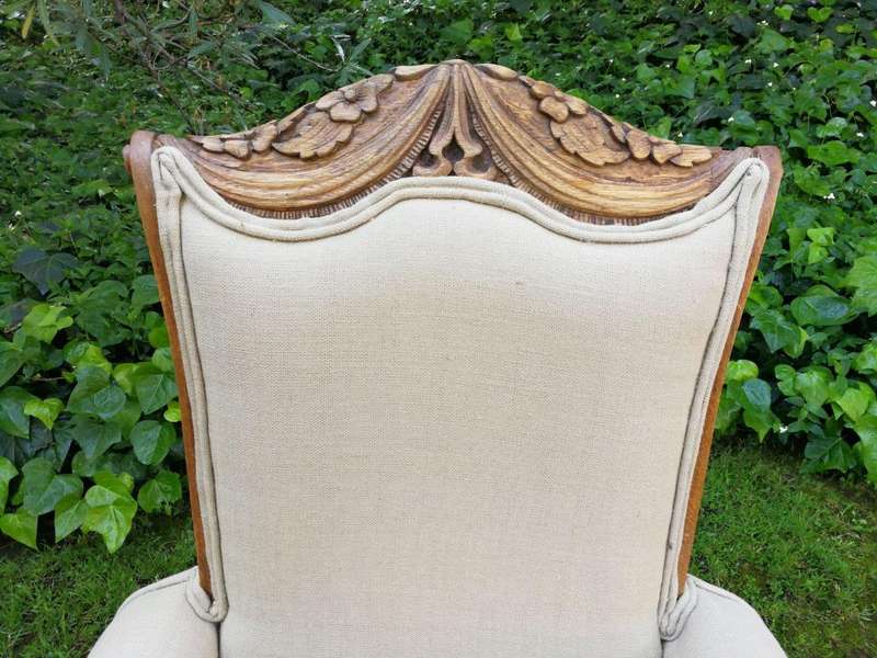 A Pair Of 1920s Bleached / Natural Carved Oak Armchairs upholstered