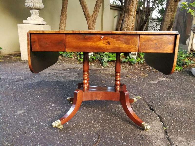 A Circa 1800 Regency Rosewood pembroke table, on castors