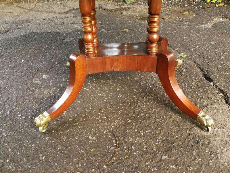 A Circa 1800 Regency Rosewood pembroke table, on castors