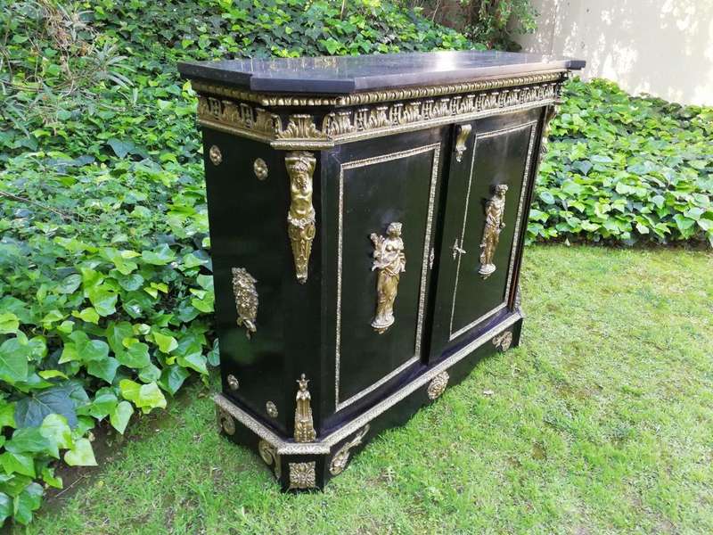 A Late 18th Century Ebonised and Ormolu Mounted Cabinet EBONISED AND ORMOLU-MOUNTED CABINET, LATE...