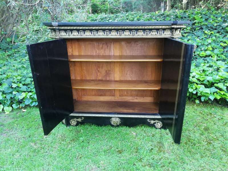 A Late 18th Century Ebonised and Ormolu Mounted Cabinet EBONISED AND ORMOLU-MOUNTED CABINET, LATE...