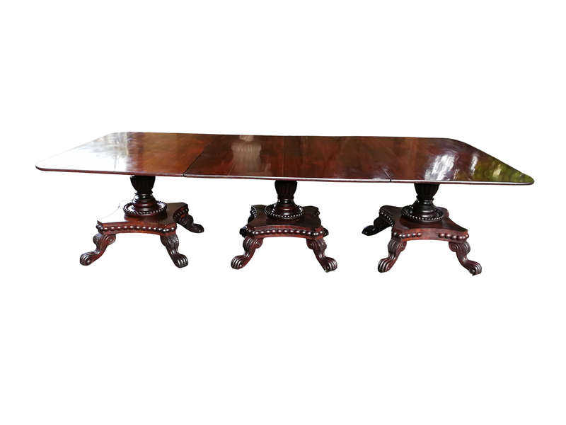 A George IV Mahogany Dining Table (Each Section Has A Tilt Top)