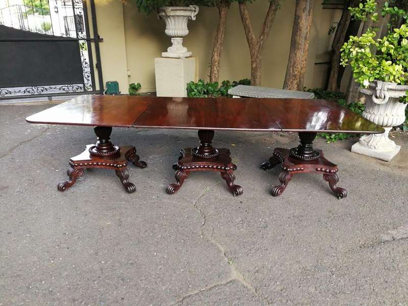 A George IV Mahogany Dining Table (Each Section Has A Tilt Top)
