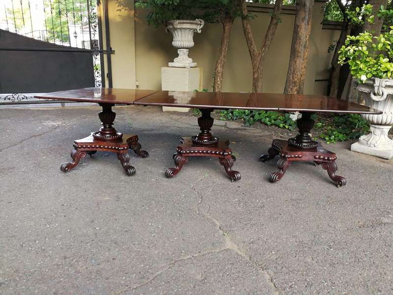 A George IV Mahogany Dining Table (Each Section Has A Tilt Top)