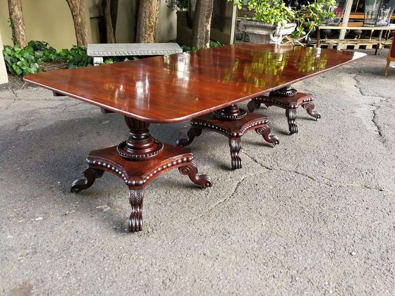 A George IV Mahogany Dining Table (Each Section Has A Tilt Top)