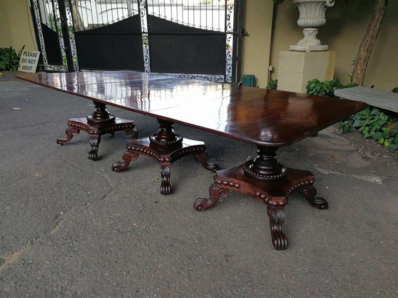 A George IV Mahogany Dining Table (Each Section Has A Tilt Top)