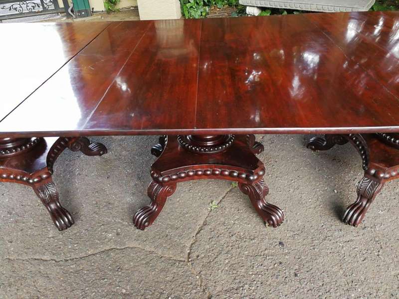 A George IV Mahogany Dining Table (Each Section Has A Tilt Top)