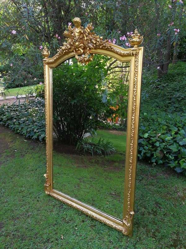 A Continental Carved Giltwood Mirror
