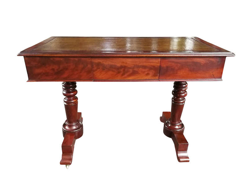 A 19th Century Flamed Mahogany Sofa / Writing Table with Leather and Hand Tooled Top On Cators