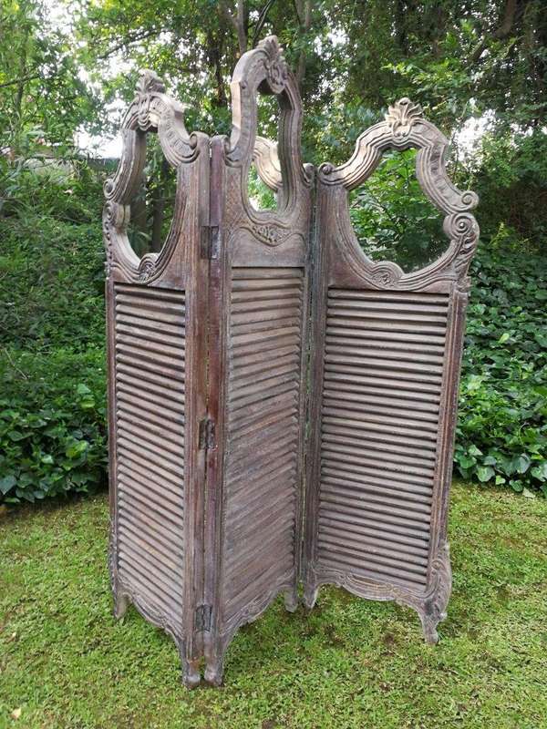 A Rococo Style Three Panel Screen With Mirrors