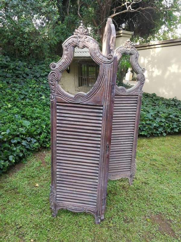 A Rococo Style Three Panel Screen With Mirrors