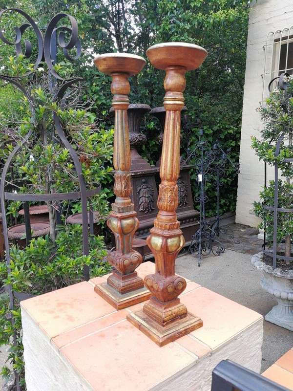 A Pair Of Gilded Wooden Candle Holders