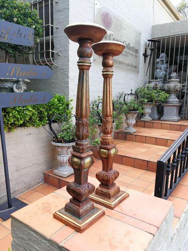 A Pair Of Gilded Wooden Candle Holders