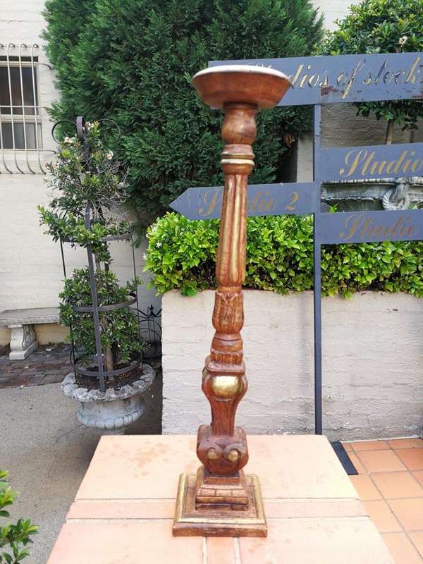 A Pair Of Gilded Wooden Candle Holders