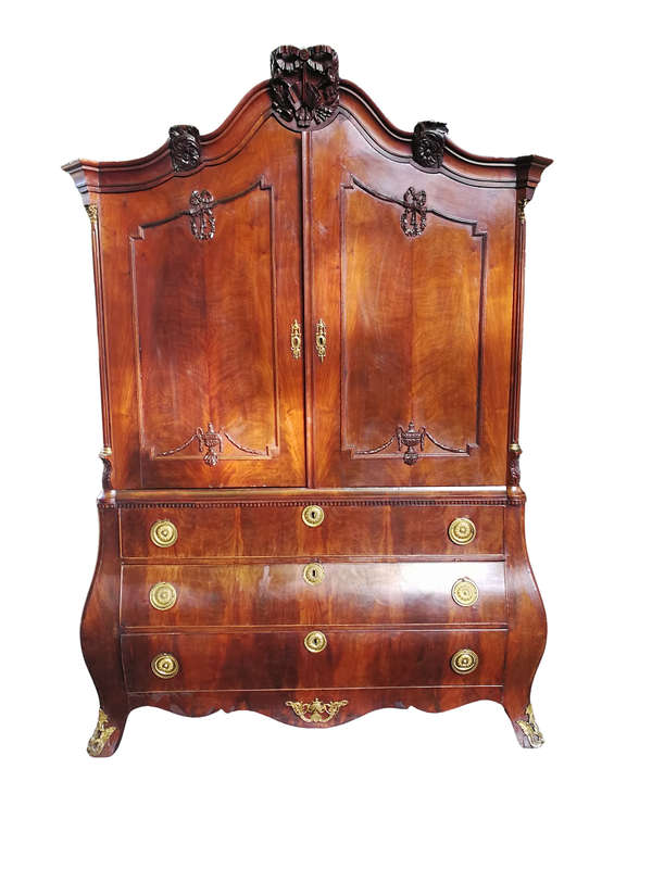 An Early 19th Century Mahogany Dutch Bombe Cabinet
