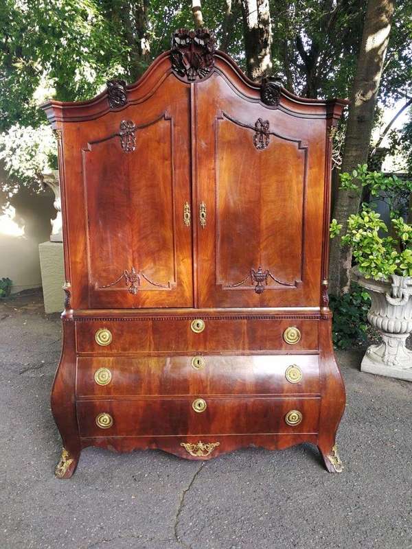 An Early 19th Century Mahogany Dutch Bombe Cabinet