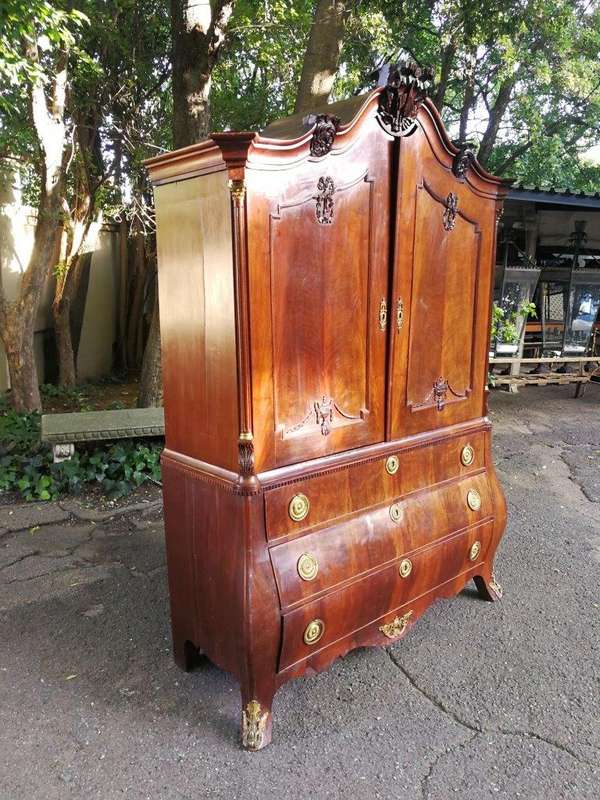 An Early 19th Century Mahogany Dutch Bombe Cabinet