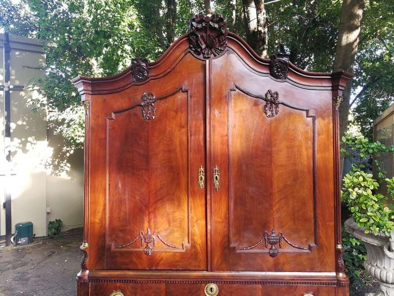 An Early 19th Century Mahogany Dutch Bombe Cabinet