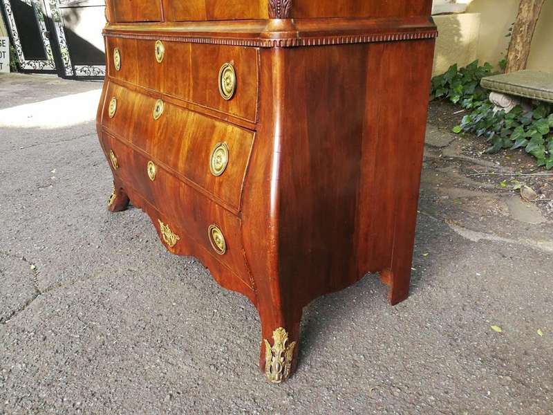 An Early 19th Century Mahogany Dutch Bombe Cabinet