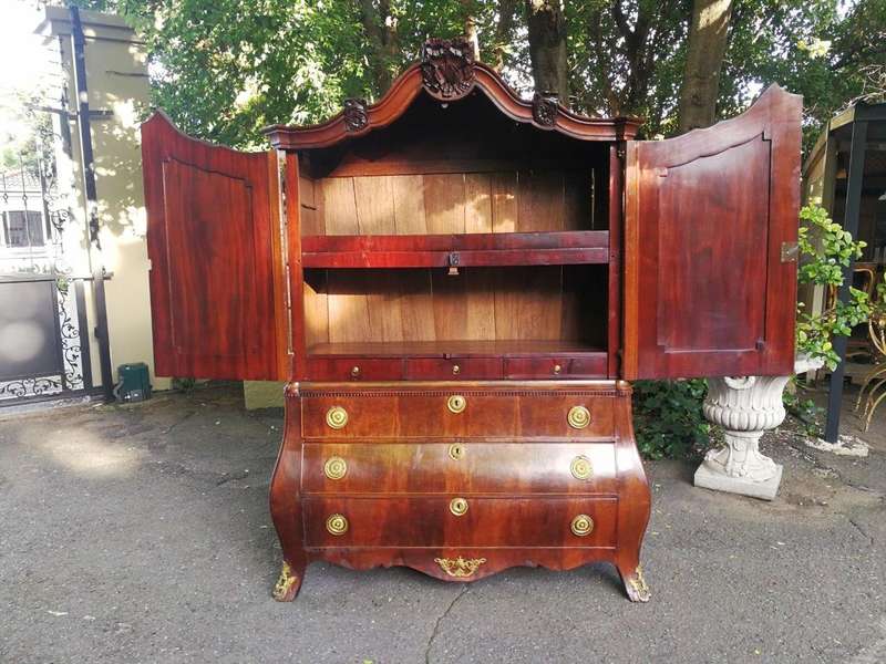 An Early 19th Century Mahogany Dutch Bombe Cabinet