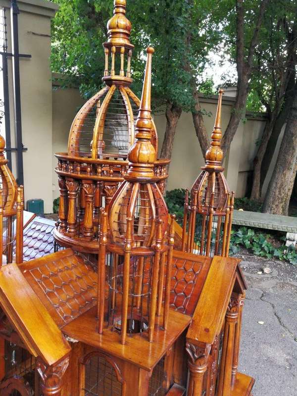 An Italian (Tuscany)  20th Century Carved Mahogany and Walnut Victorian Cathedral Style Birdcage ...