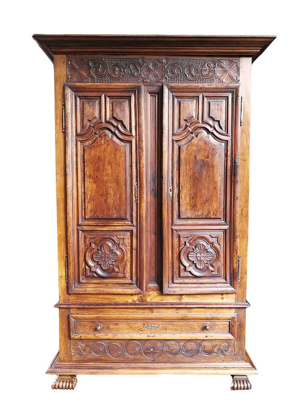 An 18th Century French Walnut Port Armoire Of Large Proportions And With Cast Iron Hinges
