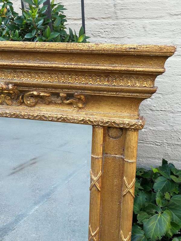 A Regency Gilt And Wood Bevelled Mirror