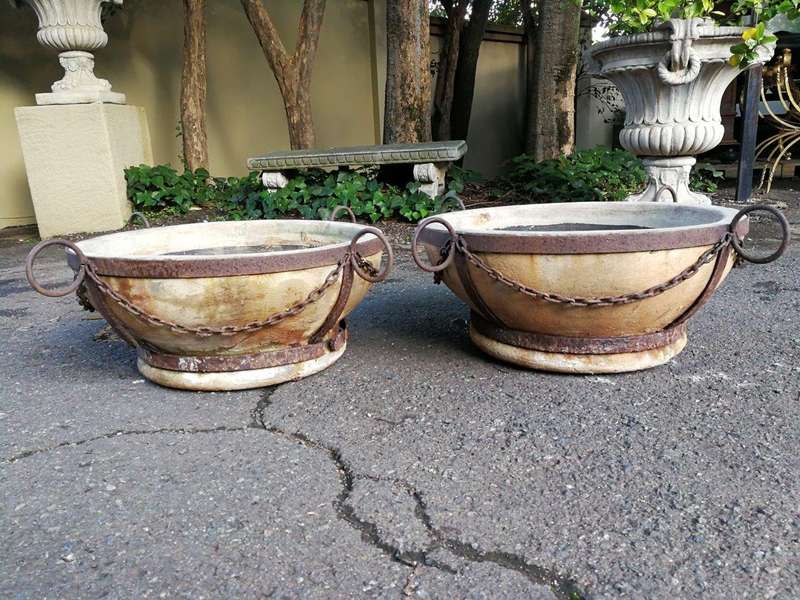 A Vintage Pair Of Terracotta And Wrought Iron Decorative Pots