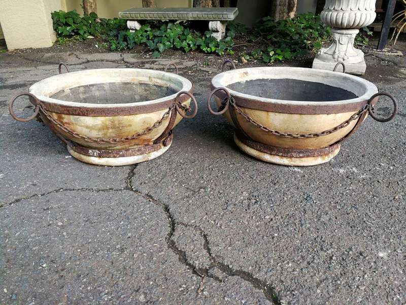 A Vintage Pair Of Terracotta And Wrought Iron Decorative Pots