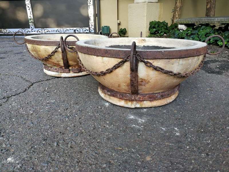 A Vintage Pair Of Terracotta And Wrought Iron Decorative Pots