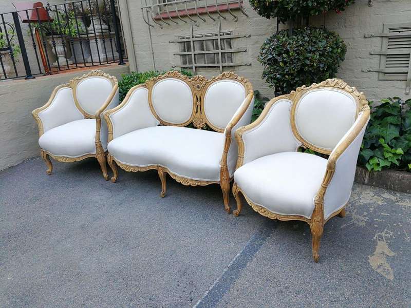 A French 20th Century Bleached / Stripped / Natural Walnut Bergére Settee and Pair of Armchairs