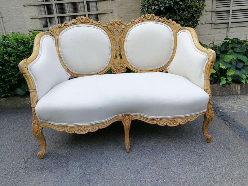A French 20th Century Bleached / Stripped / Natural Walnut Bergére Settee and Pair of Armchairs