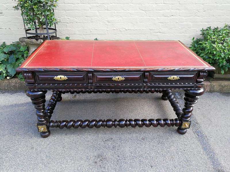 A 19th Century Portuguese Rosewood and Brass-mounted Writing Table With a Gilt-tooled Leather Wri...