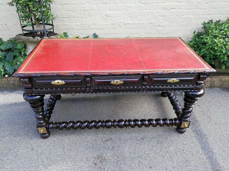 A 19th Century Portuguese Rosewood and Brass-mounted Writing Table With a Gilt-tooled Leather Wri...