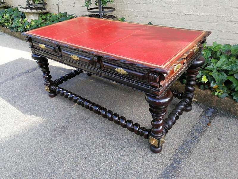 A 19th Century Portuguese Rosewood and Brass-mounted Writing Table With a Gilt-tooled Leather Wri...
