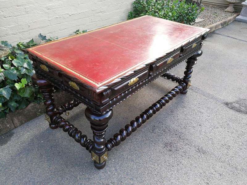 A 19th Century Portuguese Rosewood and Brass-mounted Writing Table With a Gilt-tooled Leather Wri...