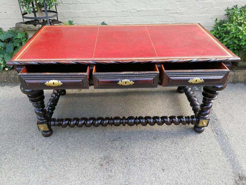 A 19th Century Portuguese Rosewood and Brass-mounted Writing Table With a Gilt-tooled Leather Wri...