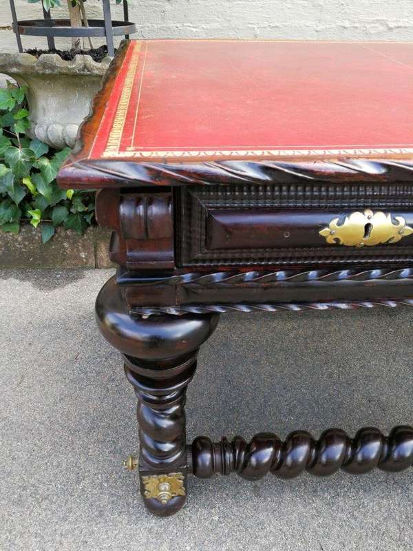 A 19th Century Portuguese Rosewood and Brass-mounted Writing Table With a Gilt-tooled Leather Wri...