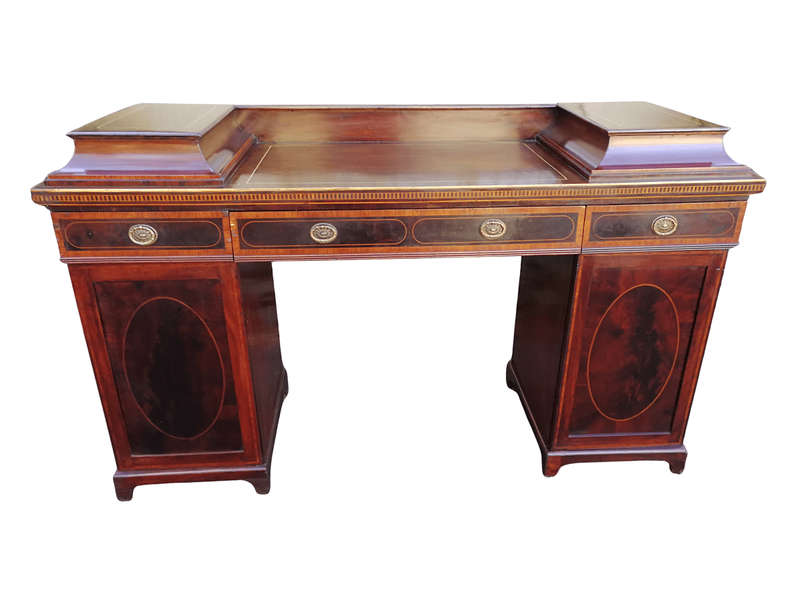 A Late Regency Inlaid Mahogany and Rosewood Pedestal Sideboard, fitted with original oval foliate...