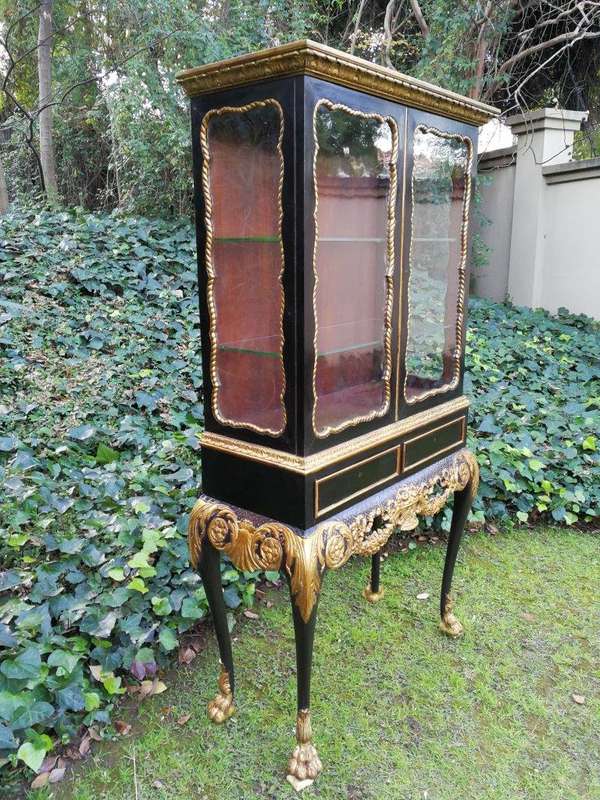 A Victorian-style Painted and Gilded Cabinet/ Display Cabinet with Carved Glazed Doors with Two D...