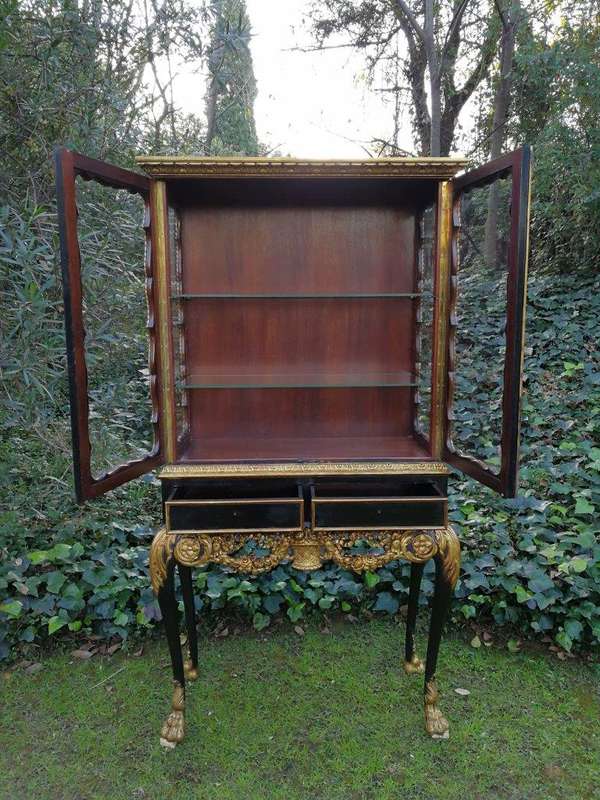 A Victorian-style Painted and Gilded Cabinet/ Display Cabinet with Carved Glazed Doors with Two D...