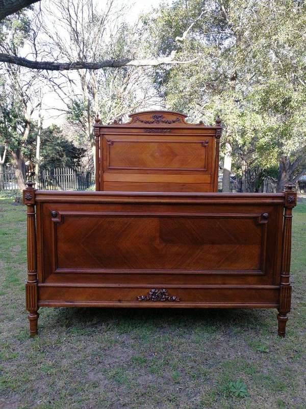 A Vintage French Carved Three-quarter Walnut Bed