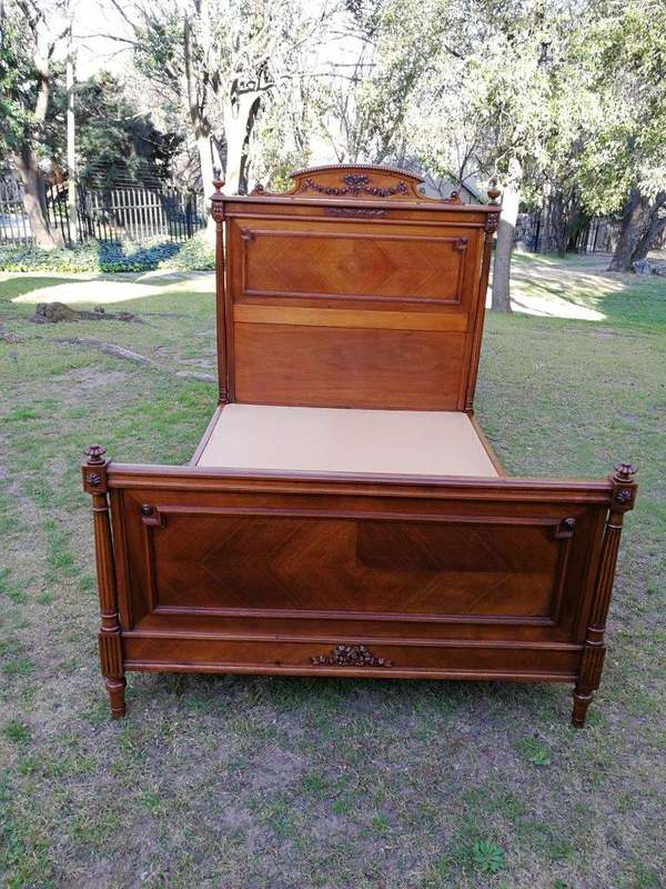 A Vintage French Carved Three-quarter Walnut Bed