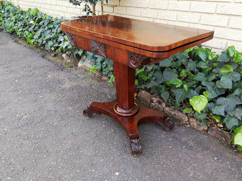 A Victorian Mahogany Folding Card Table on Castors