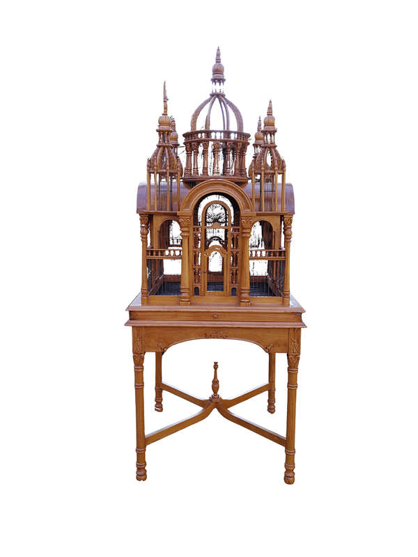 A 20th Century Carved Mahogany and Teak Wood Architectural Cathedral Style Birdcage on Stand