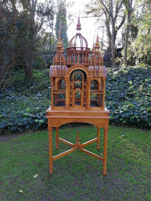 A 20th Century Carved Mahogany and Teak Wood Architectural Cathedral Style Birdcage on Stand