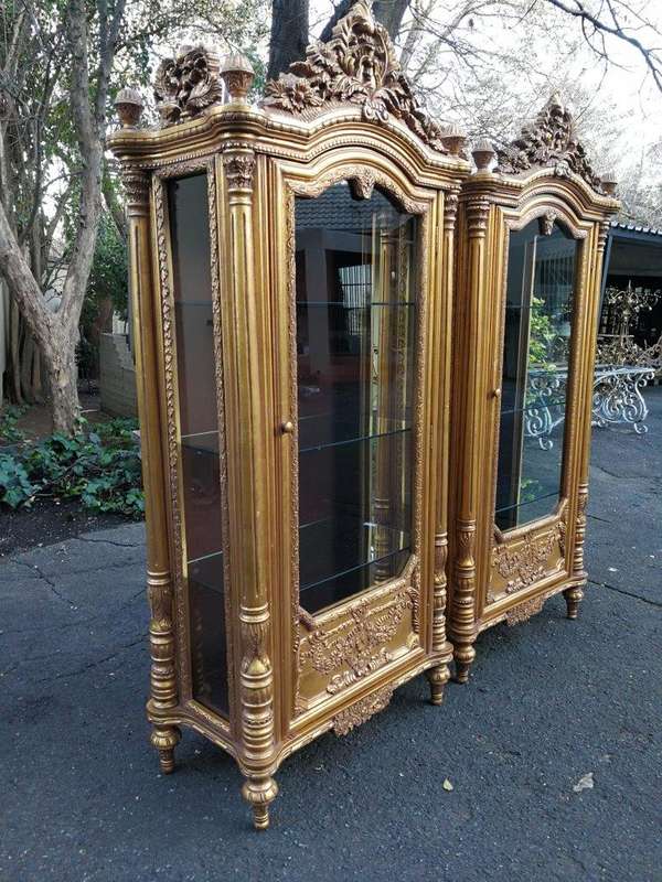 A Rare Pair of 20th Century Giltwood Display Cabinets
