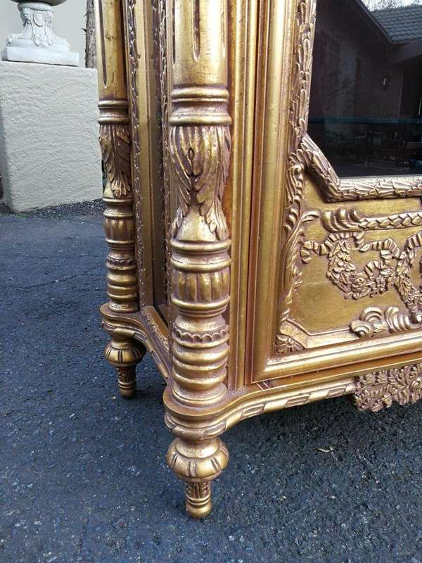 A Rare Pair of 20th Century Giltwood Display Cabinets
