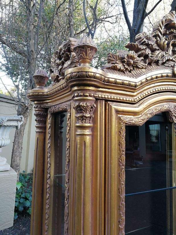 A Rare Pair of 20th Century Giltwood Display Cabinets