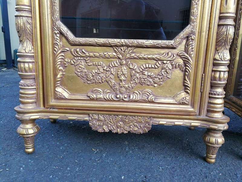A Rare Pair of 20th Century Giltwood Display Cabinets